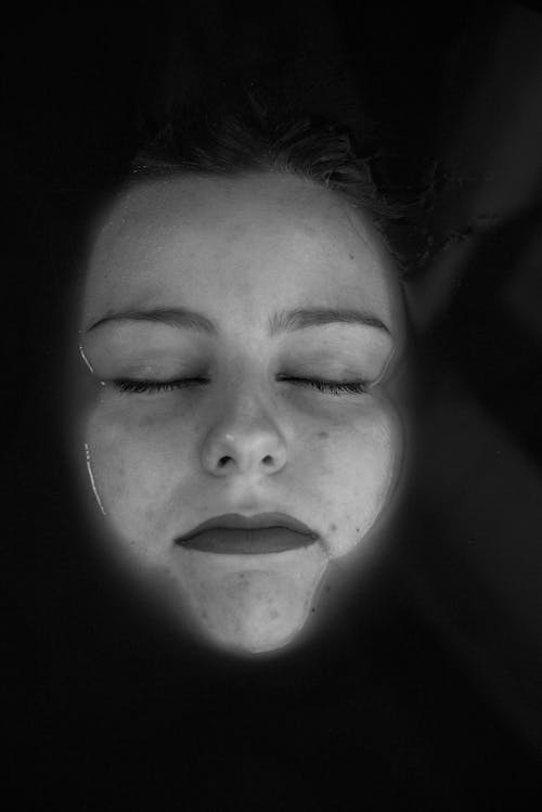 Grayscale Photo of Womans Face