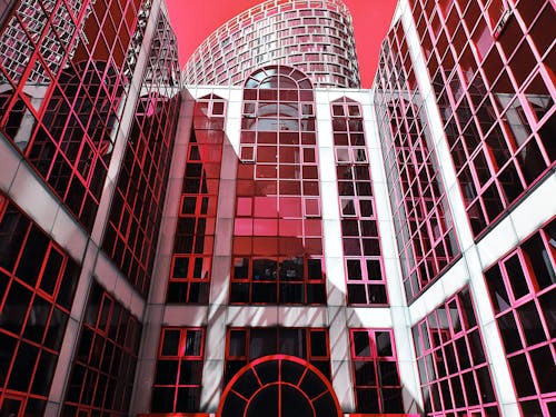 Red and Pink High-rise Building