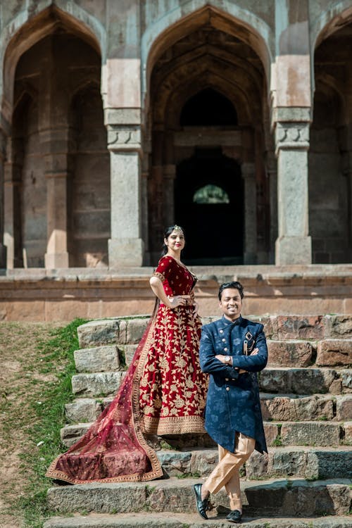 A Couple Standing on the Stairs