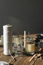 Aroma candles with wick on wooden table
