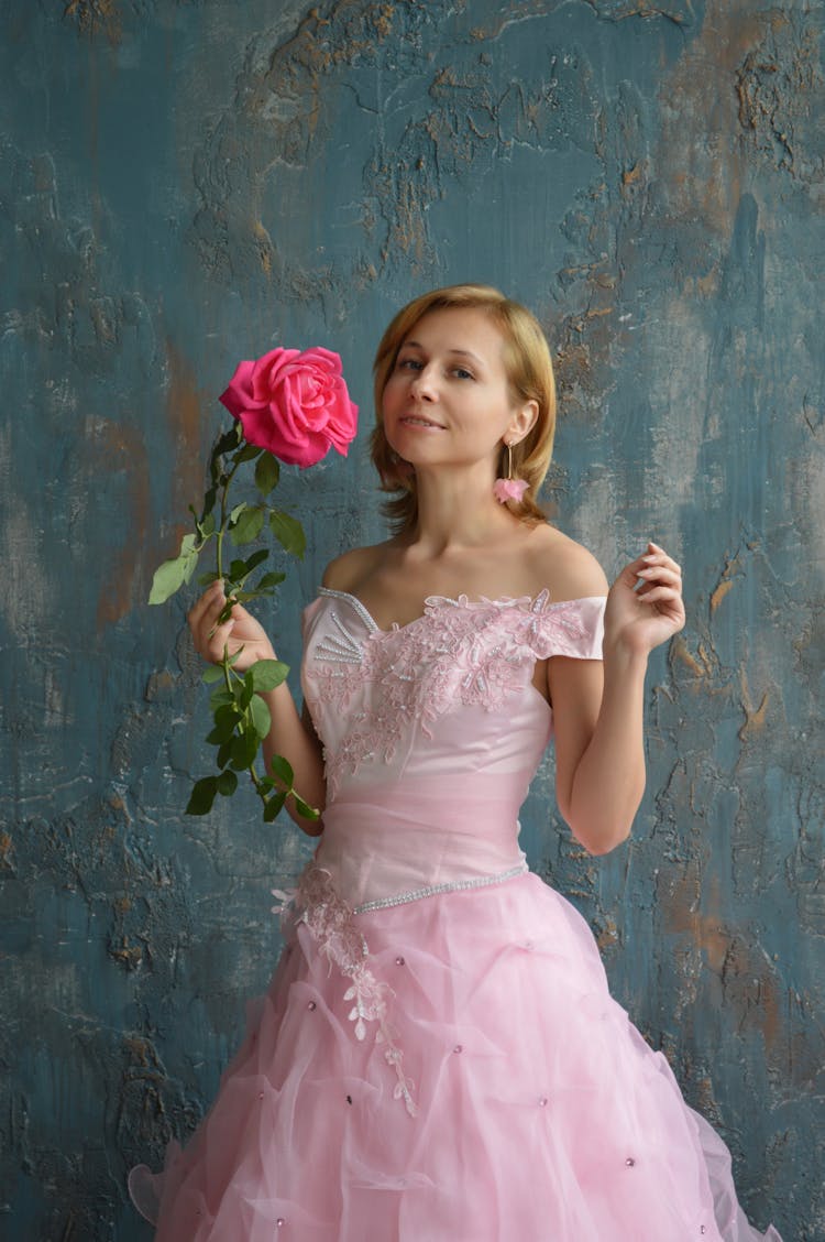 Romantic Bride In Pink Dress With Flower