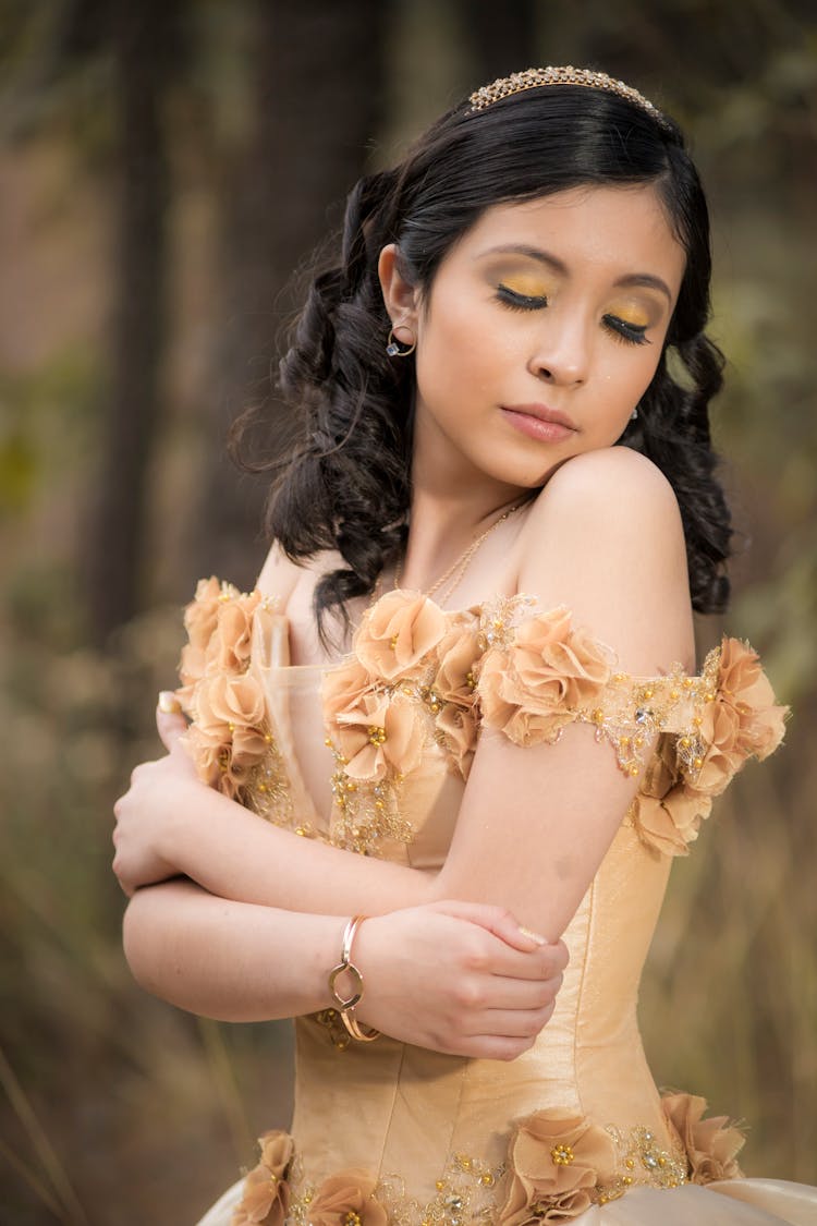 Woman In Gold Floral Dress