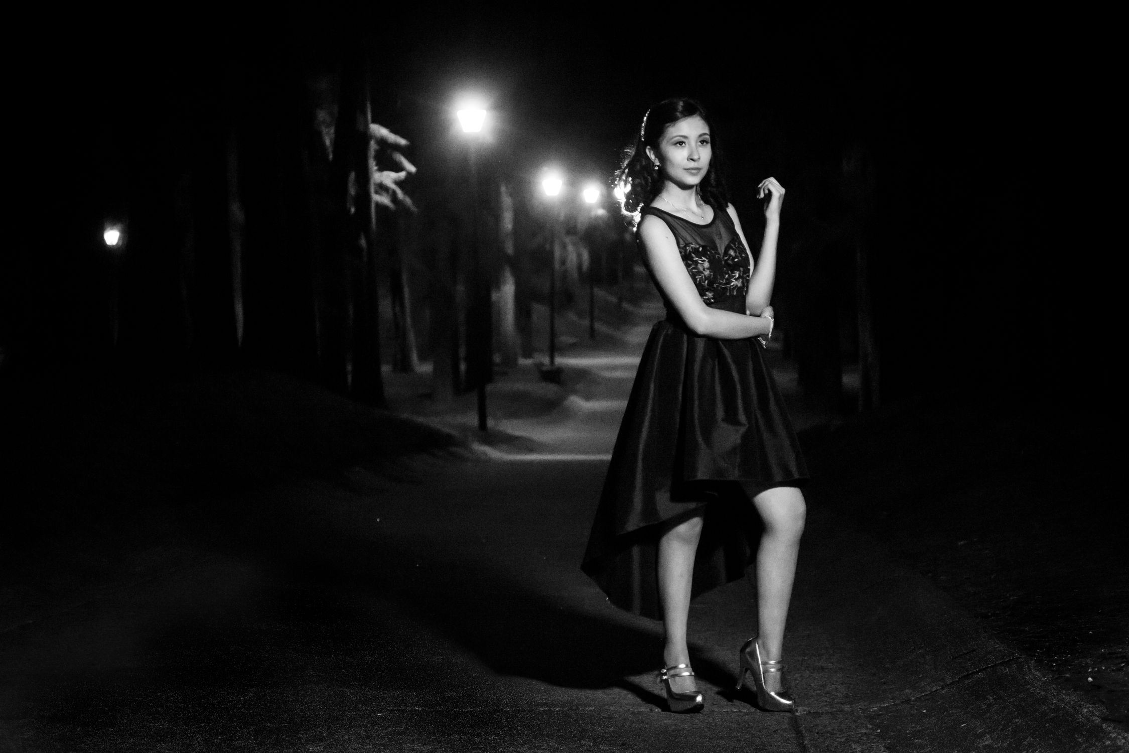 Grayscale Photo Of Woman in Black Dress Standing On The Street · Free ...