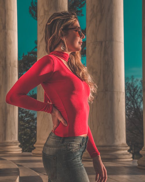 Free Side View Of Woman in Red Long Sleeve Stock Photo