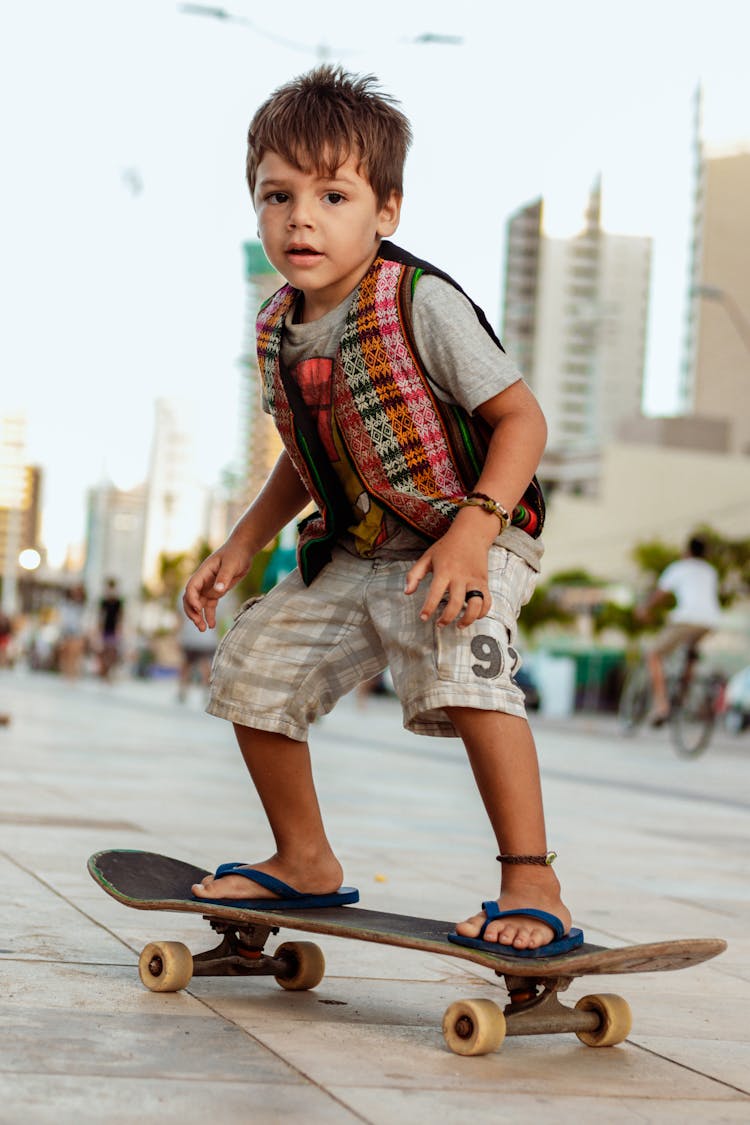 A Boy Riding A Skateboard