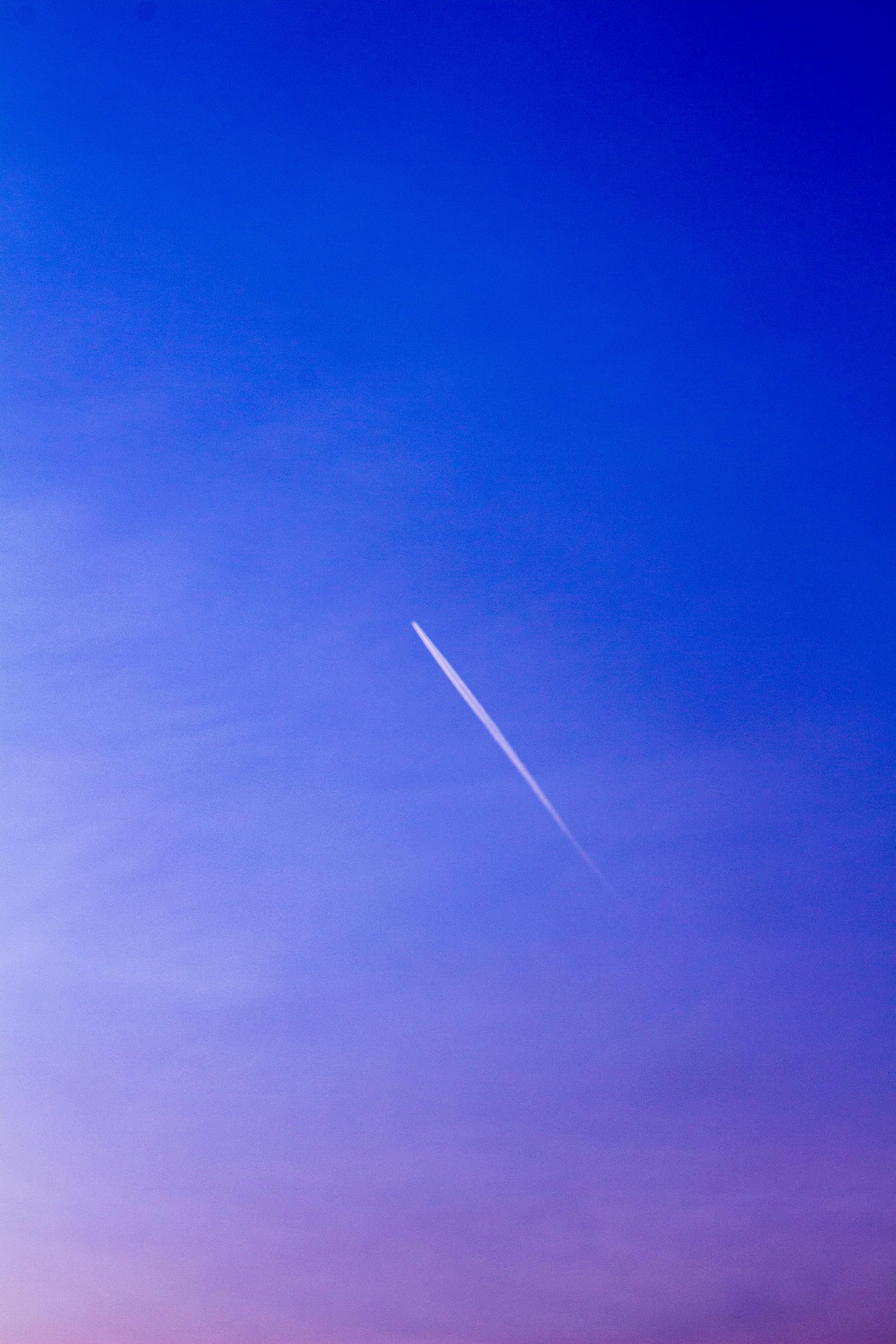 Pregnant woman relaxing on a beach