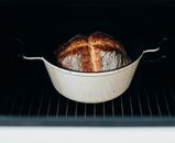 Cooking bread in form for cooking in oven