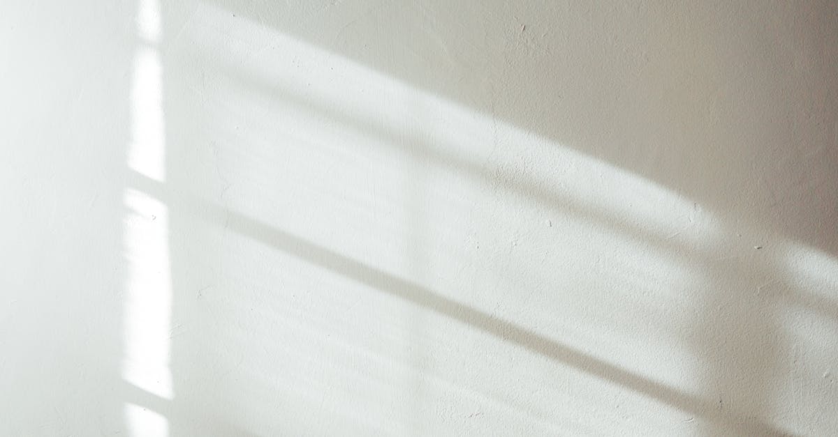 White wall with sunlight and shadow · Free Stock Photo