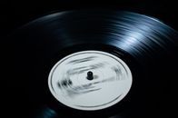 Playing Black Vinyl Record