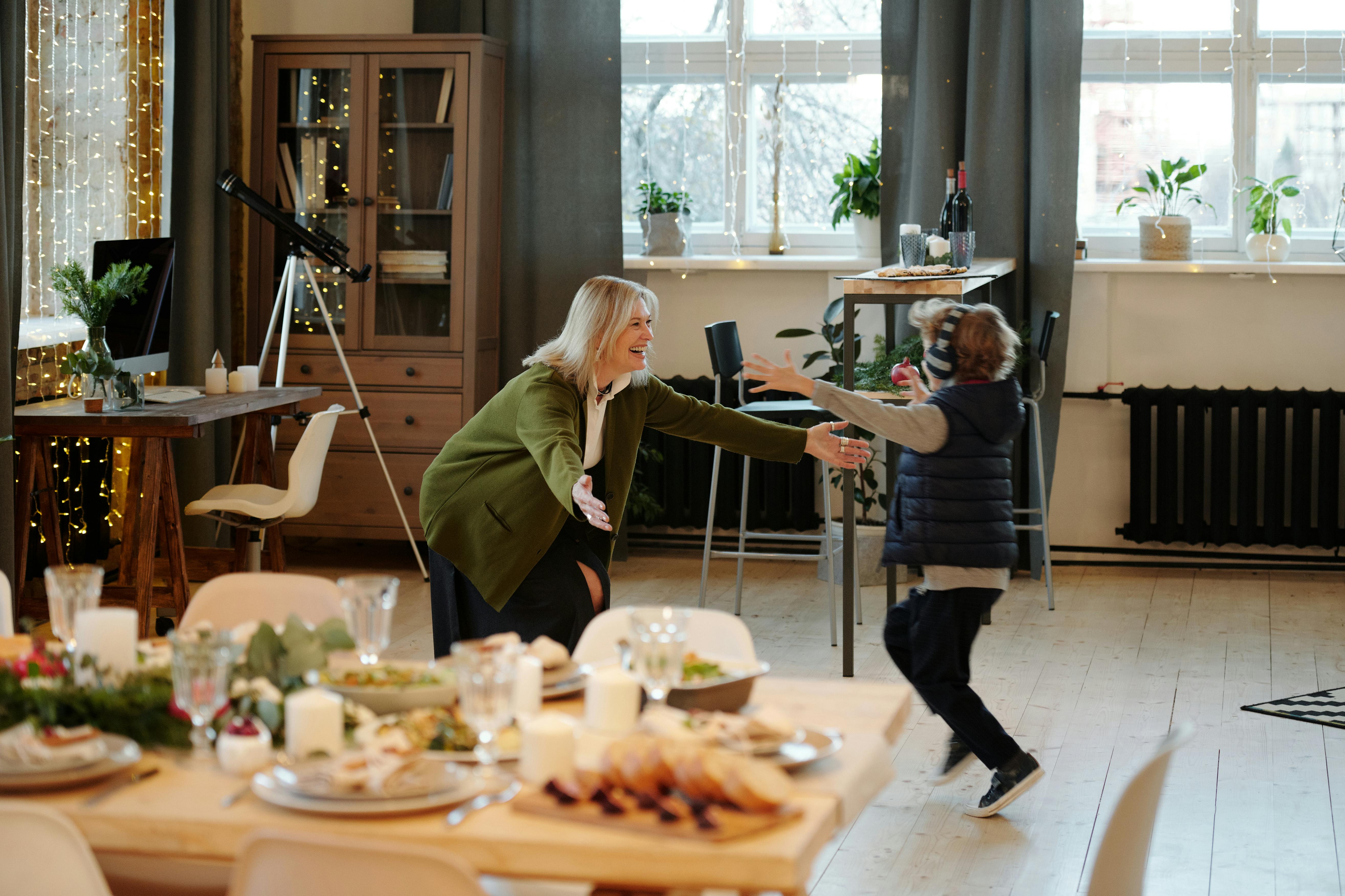 grandmother happily welcoming her grandson