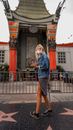 Stylish young lady sightseeing city during trip