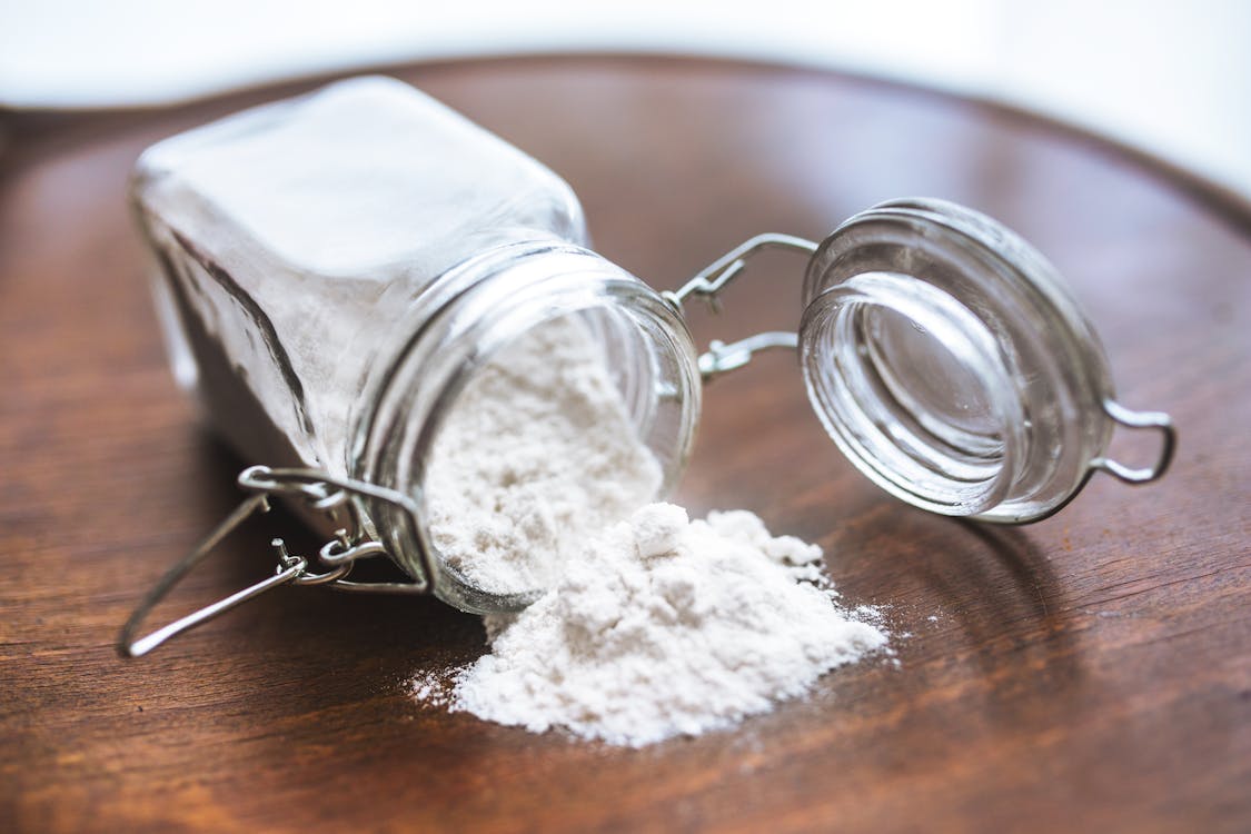 Powder in a glass jar, tipped over