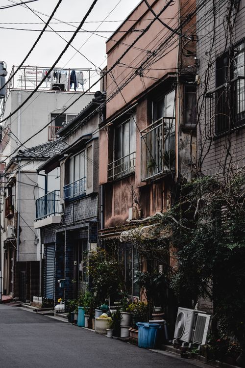 Free Charming street view of vintage houses and overhead wires in Japan, showcasing urban nostalgia. Stock Photo
