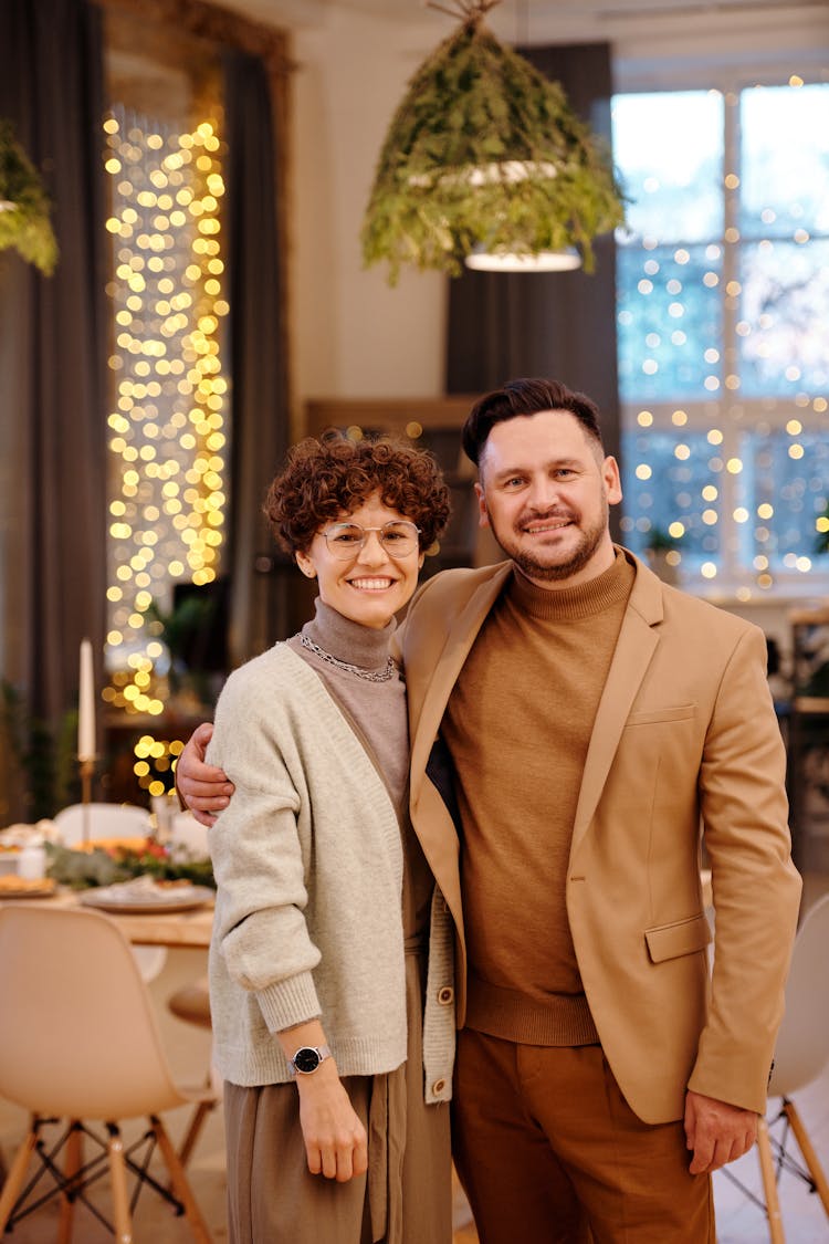 Couple Smiling While Looking At The Camera