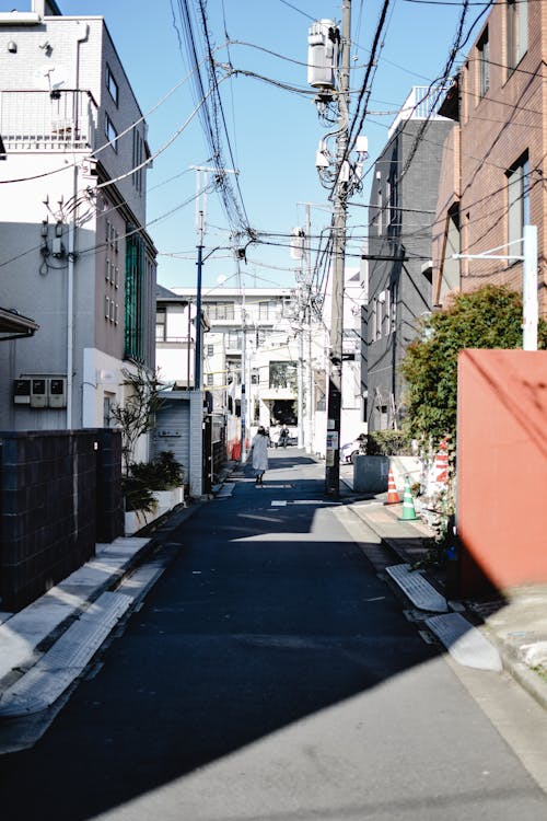 An Empty Street between Buildings