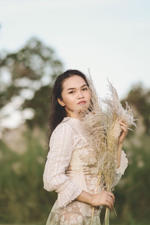 Shallow Focus Photo of Woman in White Lace Dress