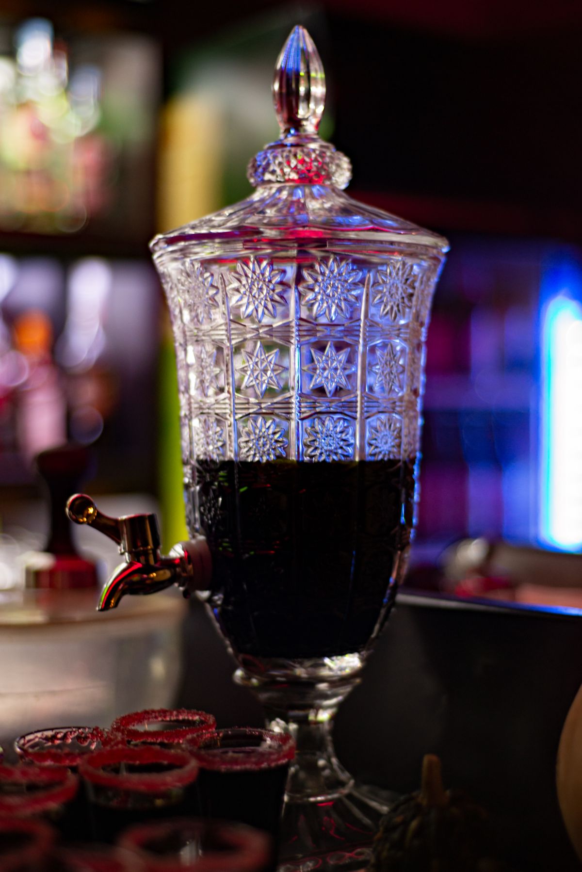 Dark cherry punch in a crystal beverage dispenser