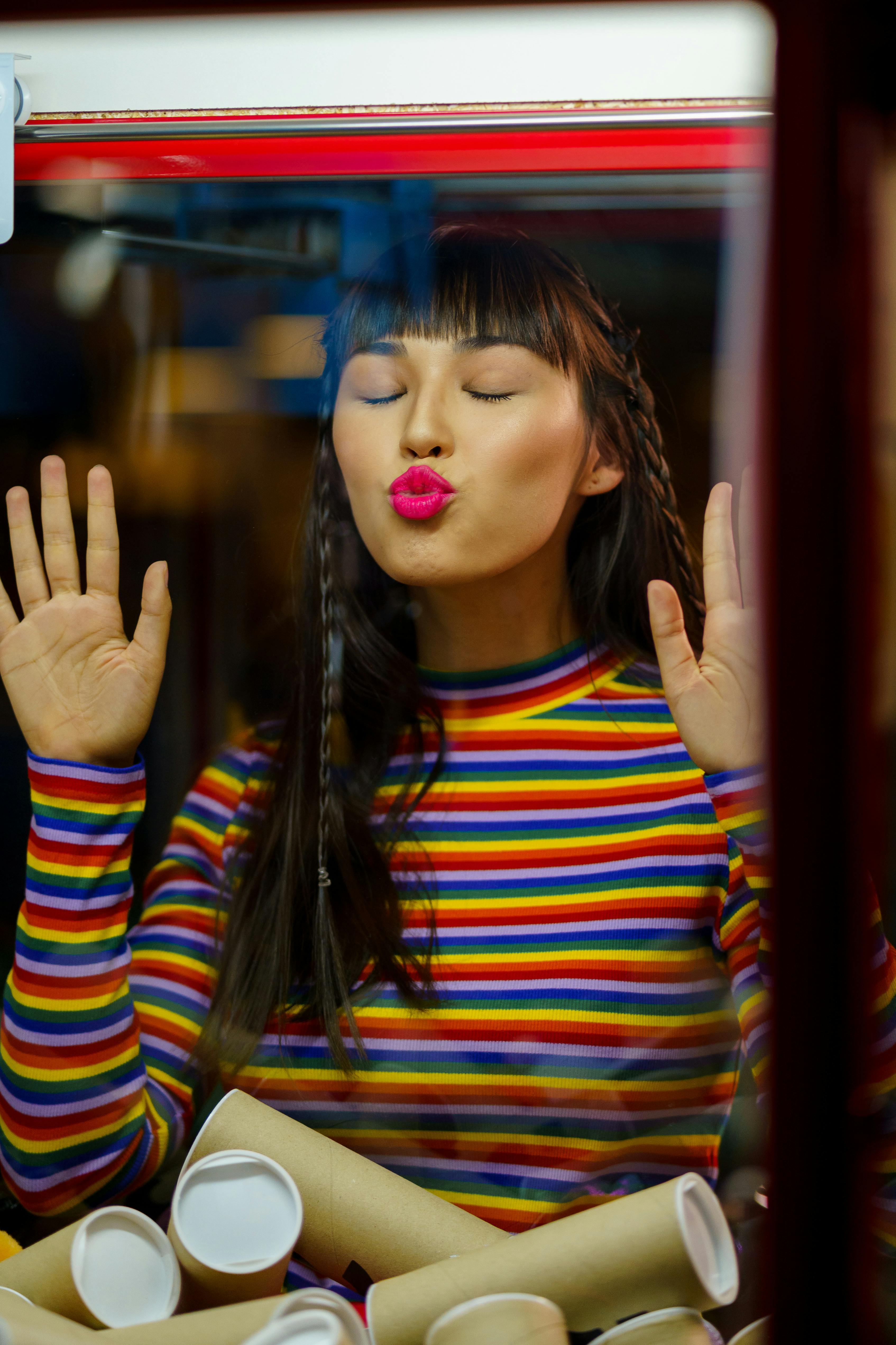 A Woman Kissing a Glass · Free Stock Photo