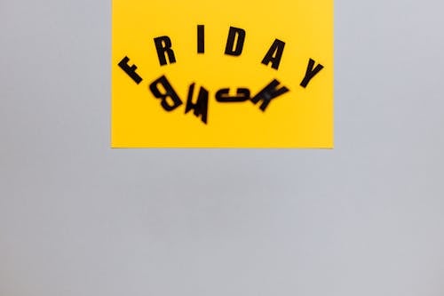 Free 
Black Letter Cutouts on a Yellow Paper Stock Photo
