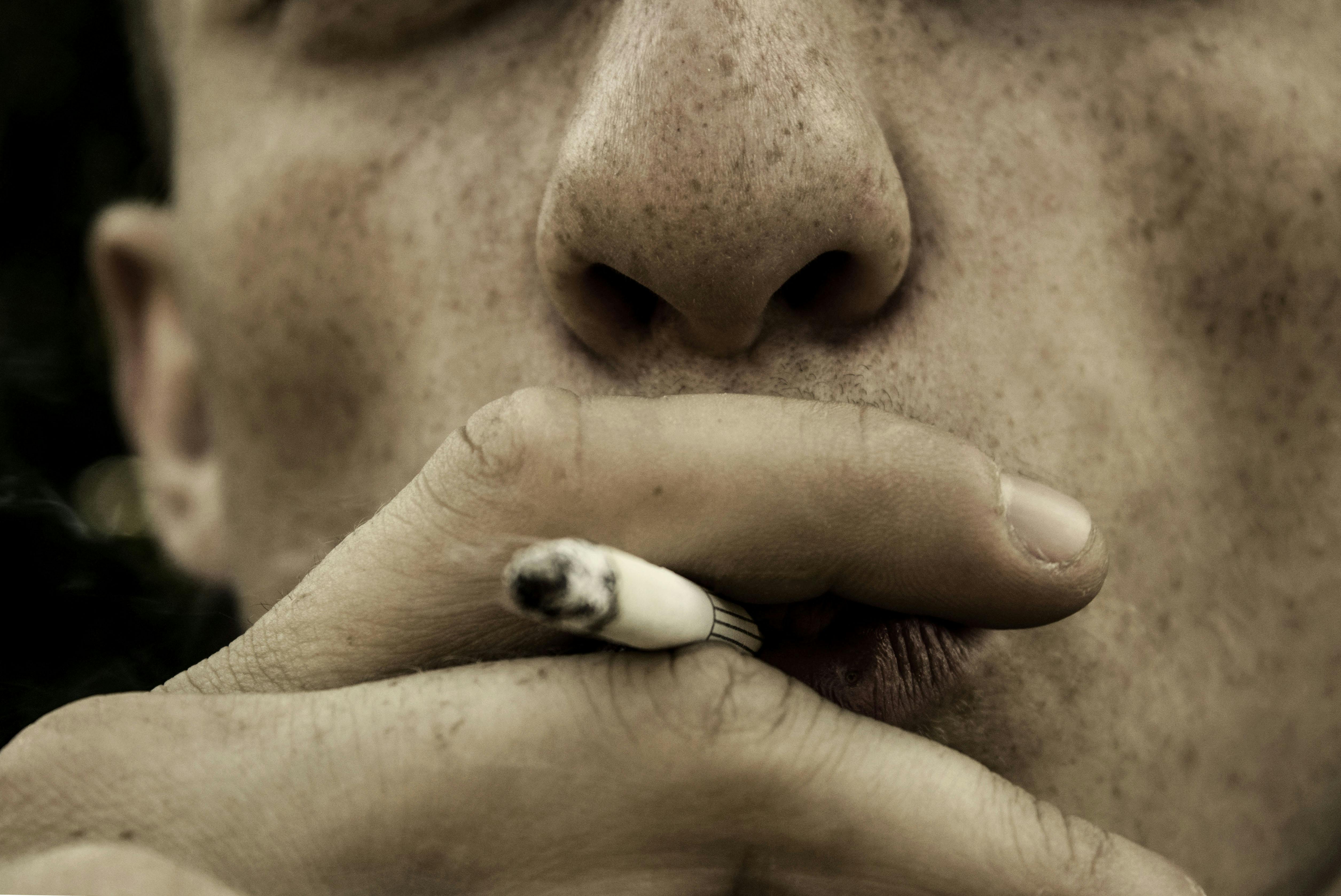 Free stock photo of man, person, hand, cigar