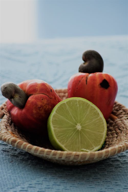 Cashews and Sliced Lime in a Woven Basket