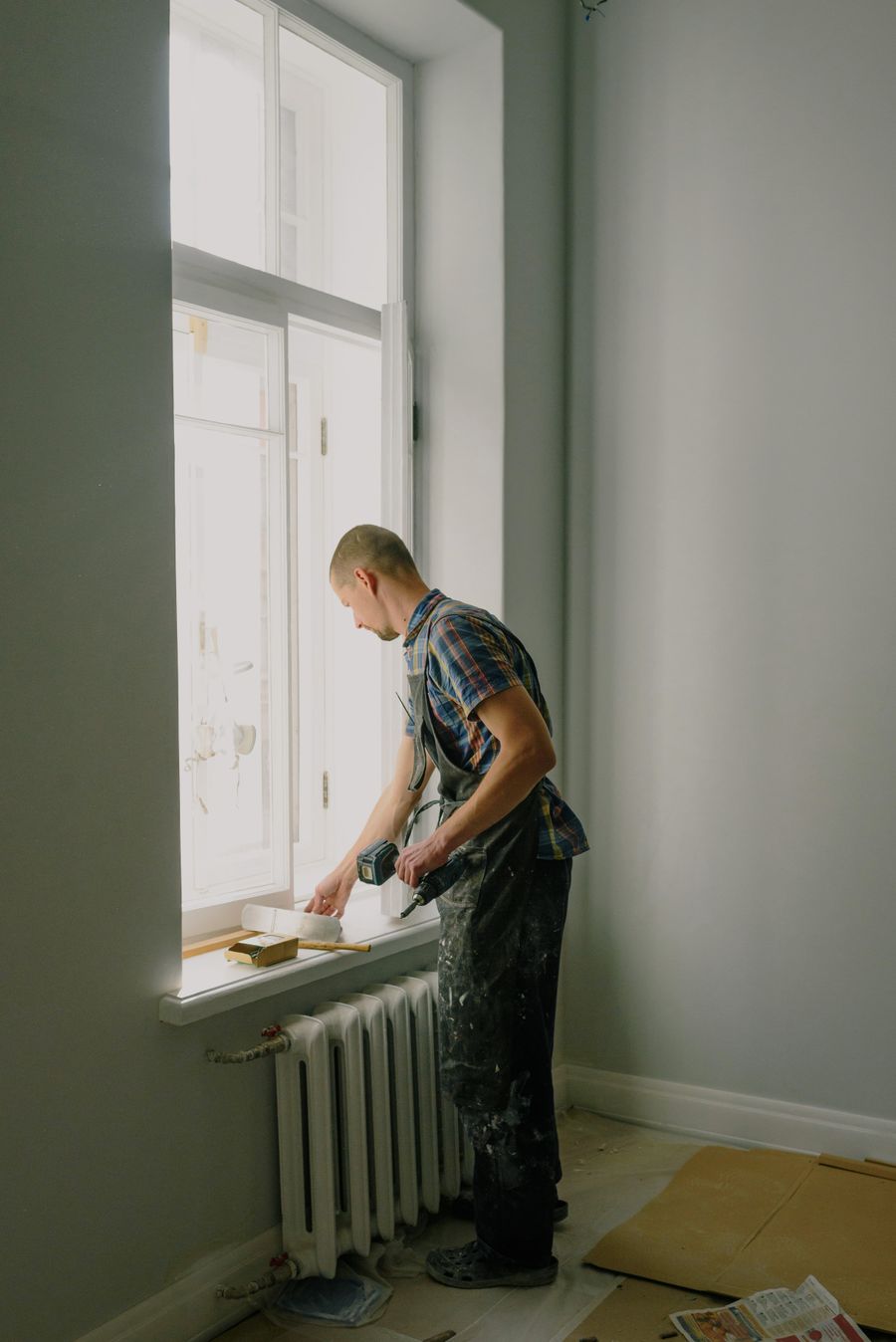 Handyman using tools for a home repair