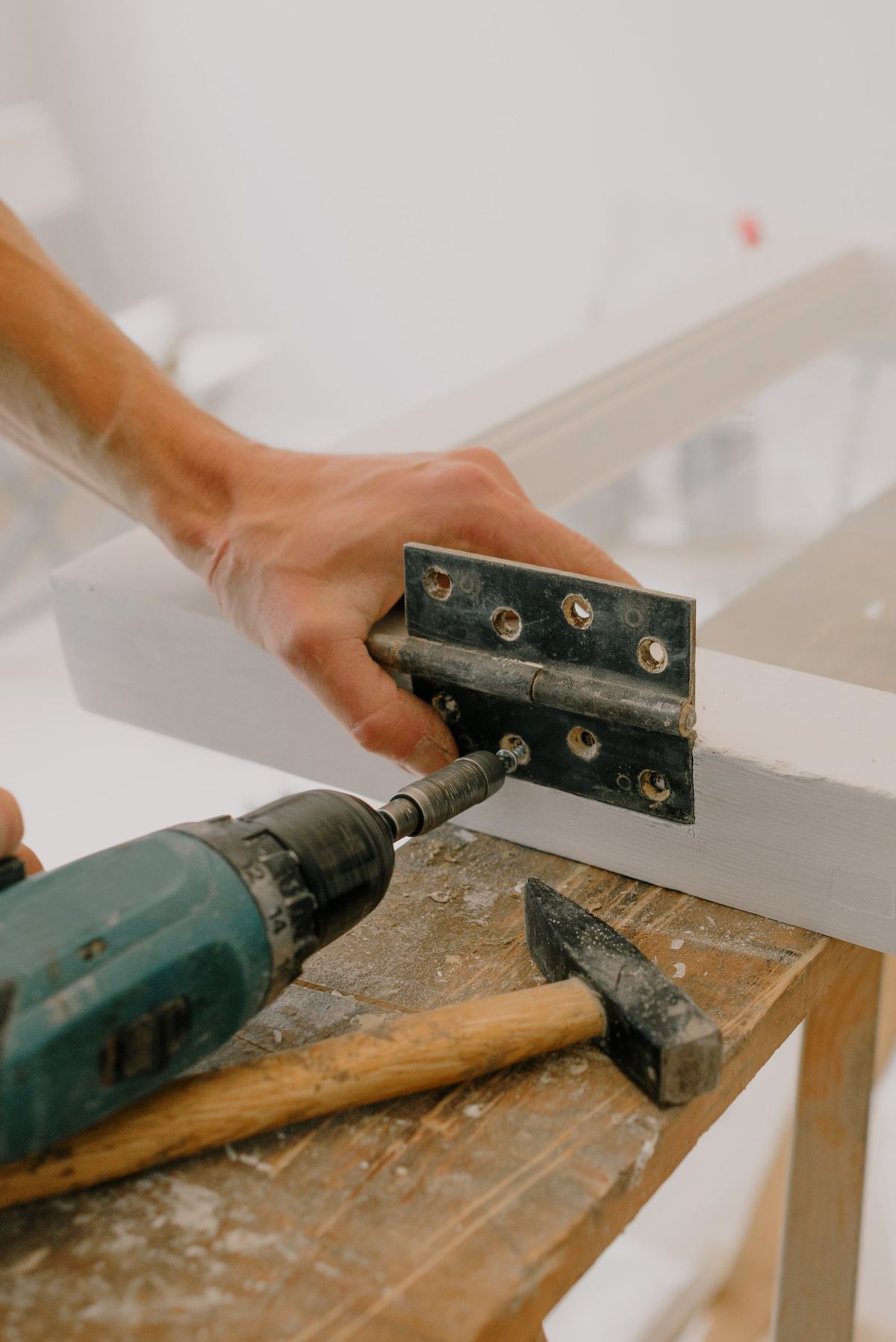 Stock photo of handyman window repair work