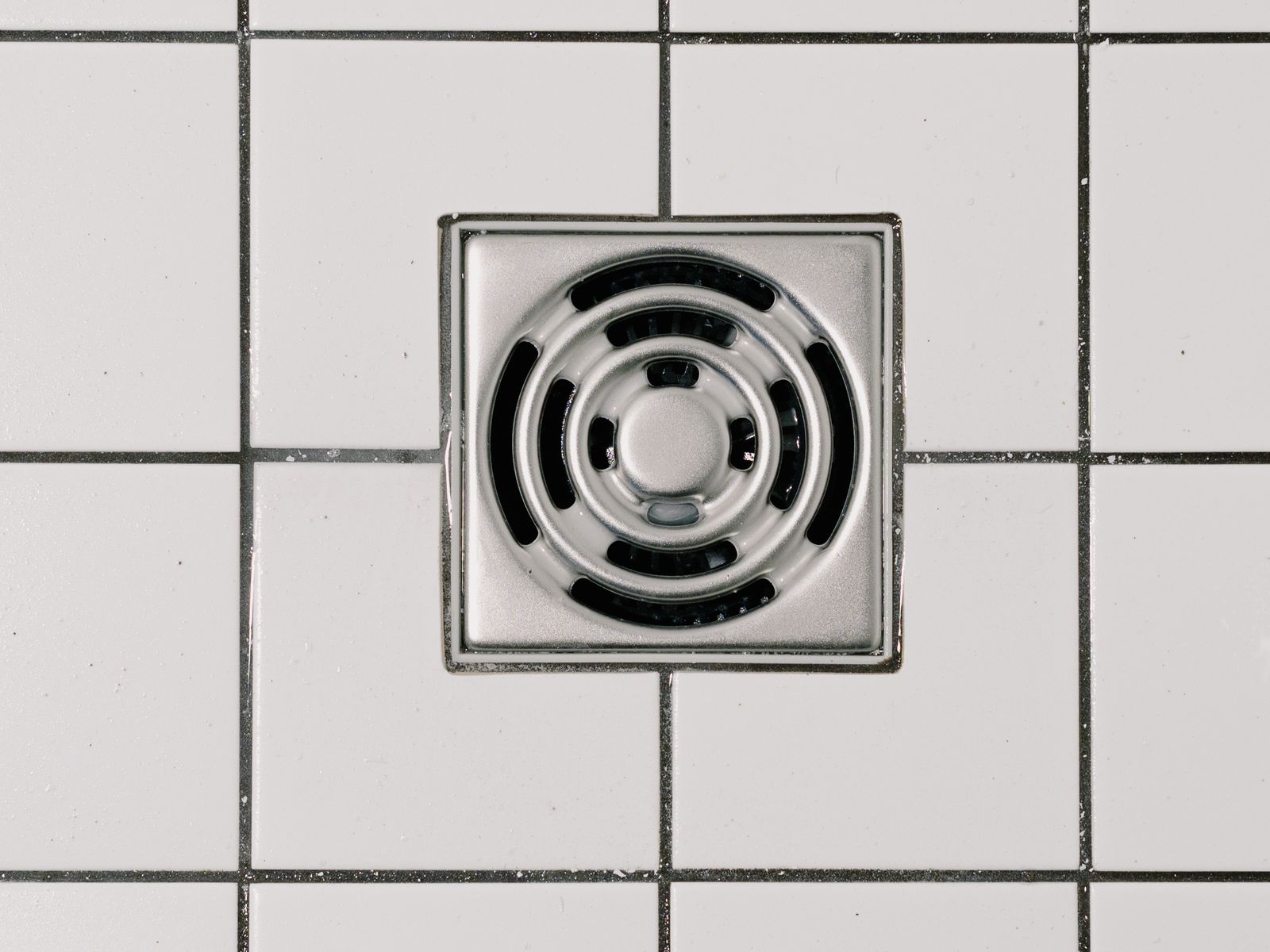 Clean, clear shower drain after professional drain cleaning