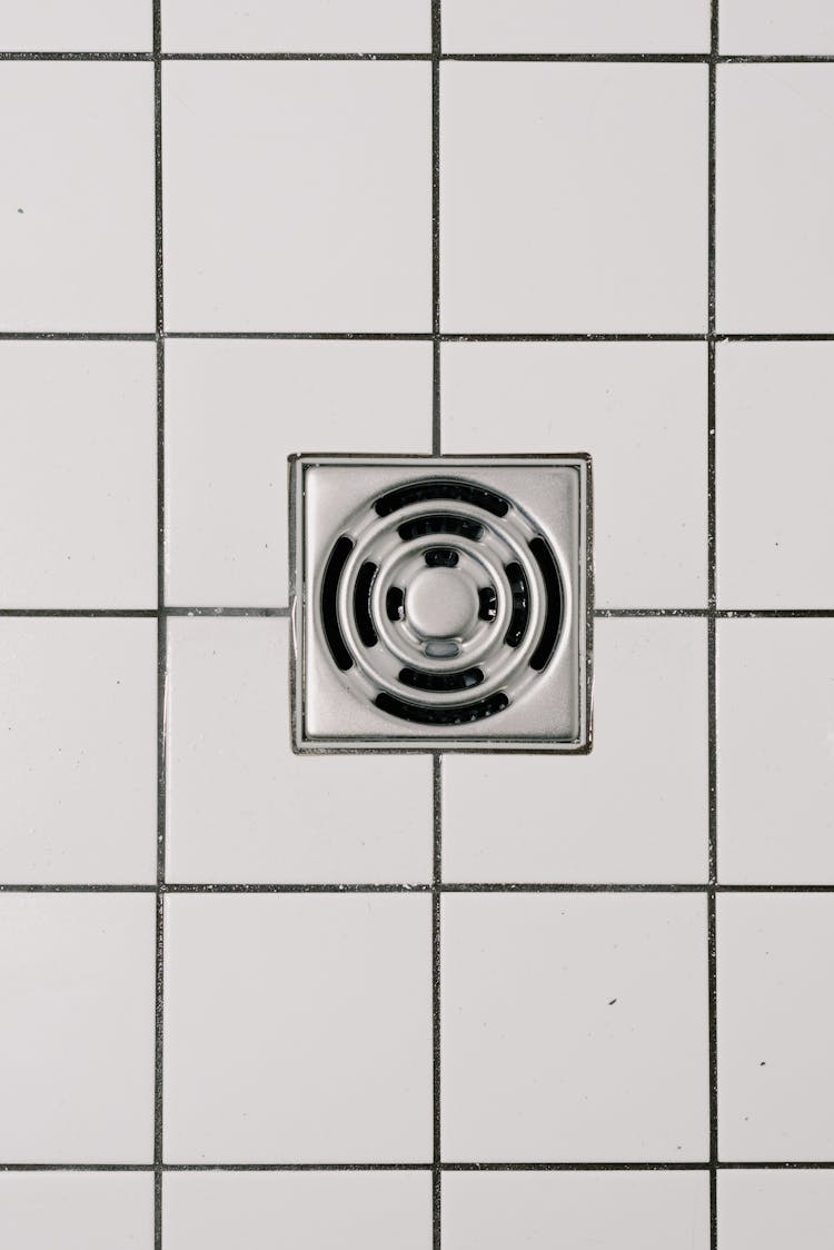 Stainless Steel Cover Of Drain In Modern Shower