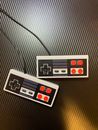 White and Black Game Controller