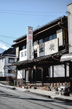 Charming street view of old wooden facades in Nikko, Japan.