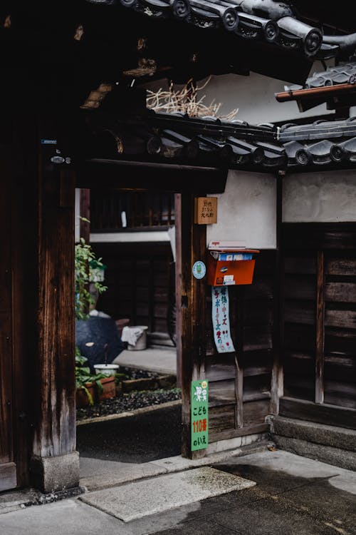 A Letterbox Near Brown Wooden Doorway