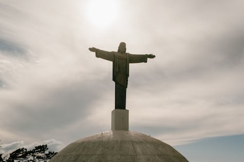 Free Statue of Christ the Redeemer Under White Sky Stock Photo