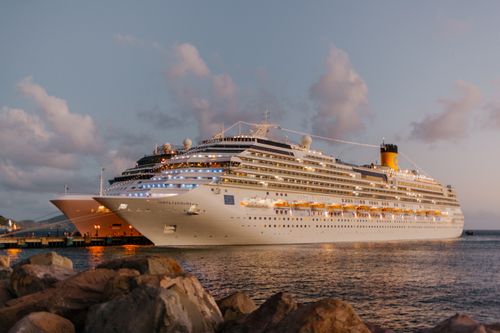 Free Beautiful cruise ships docked at sunset, offering a luxurious travel experience. Stock Photo