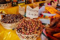 Baskets of Nutmeg on a Yellow Surface