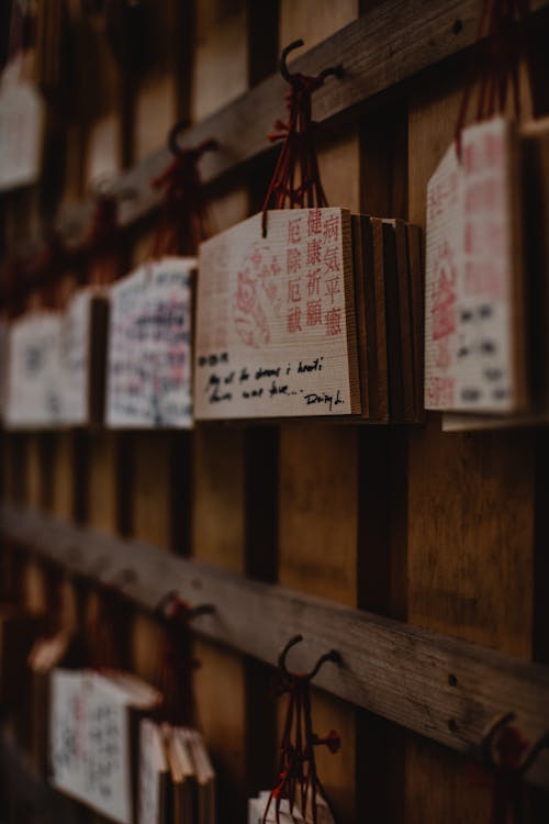 Close-up Photo of Hanging Ema's on a Japanese Shrine 