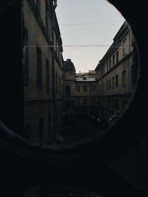 View of the Old Apartment Buildings from the Round Glass Window