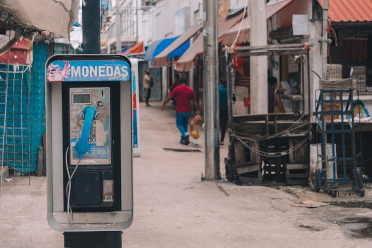 An Old Payphone Booth On The Street