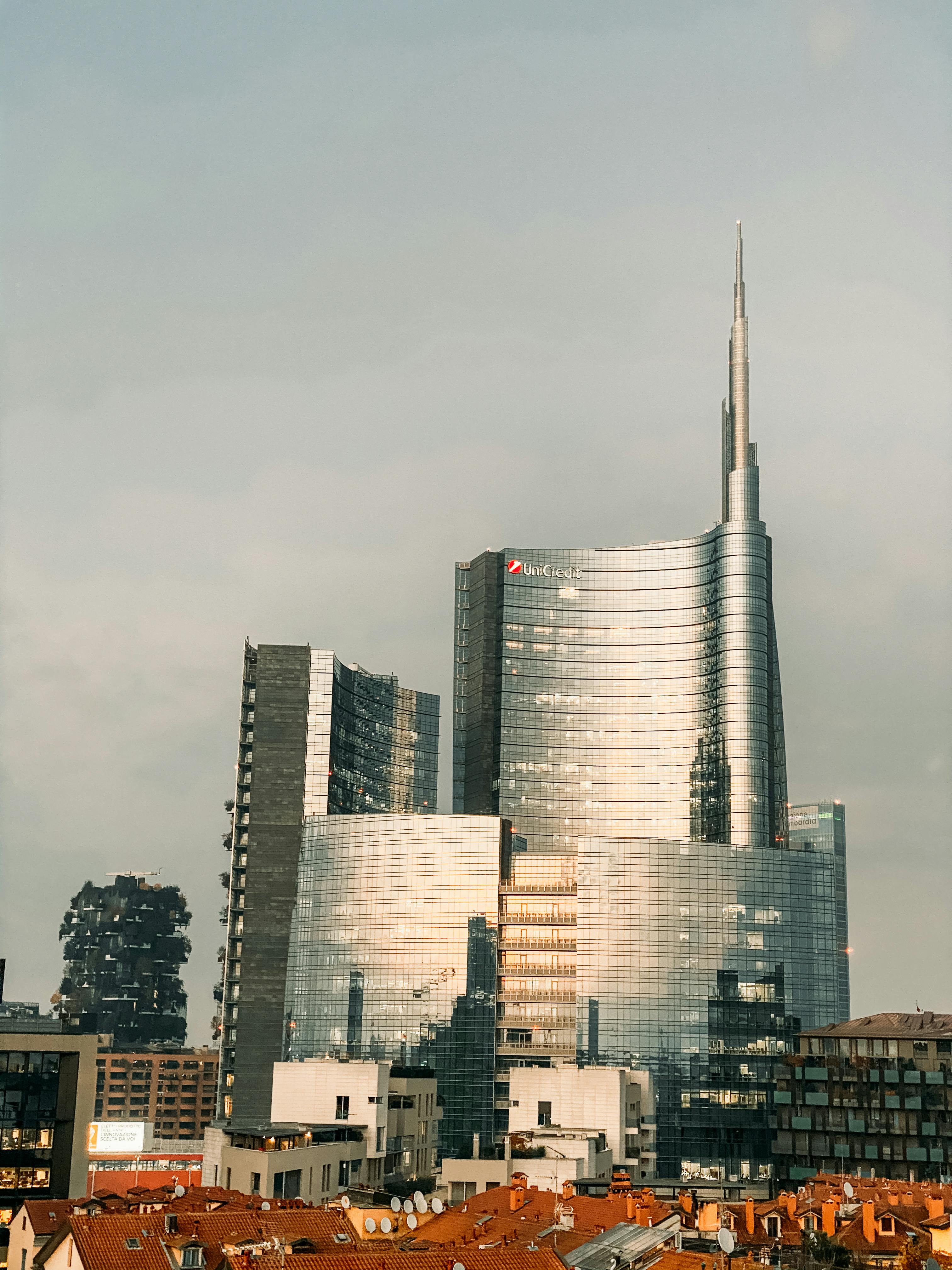 unicredit tower under white sky