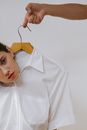 Woman in White Button Up Shirt