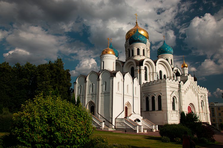 White Orthodox Church With Gold And Blue Domes 