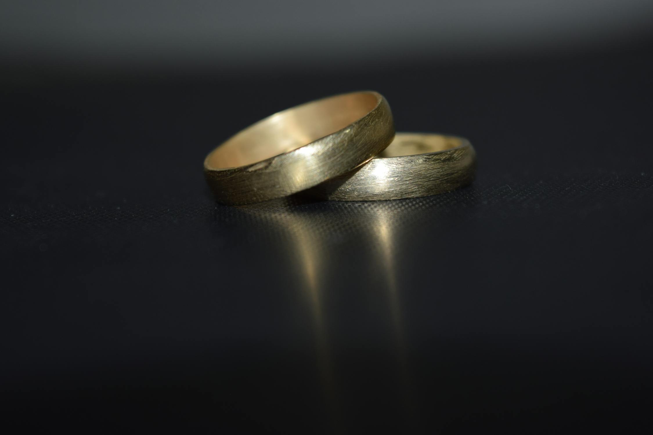 Free stock photo of black background, gold rings, matte