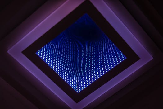 A captivating abstract view of a LED infinity mirror with vibrant light patterns.