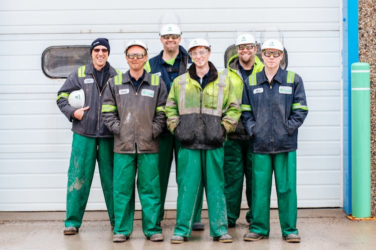 Group Of Workers In Uniforms