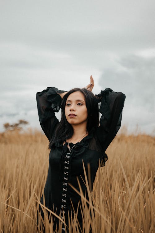 Woman Posing on a Field 