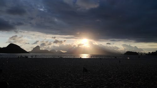 Fotos de stock gratuitas de cielo, playa, sol de tarde