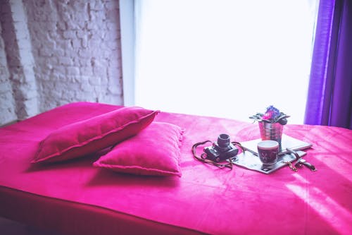 Free Pink bed & pillows Stock Photo