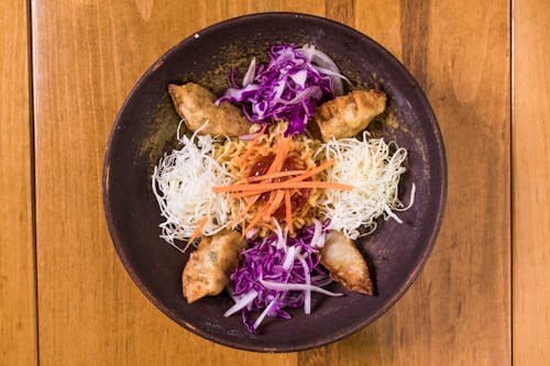 Delicious Fried Dumplings with Shredded Red Cabbage 