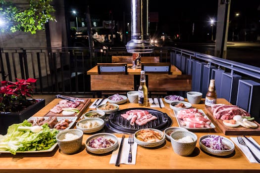 Delicious Korean BBQ spread with meats and vegetables. Perfect for dining enthusiasts.