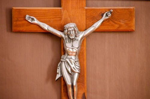 Close-Up Shot of a Crucifix on a Wall